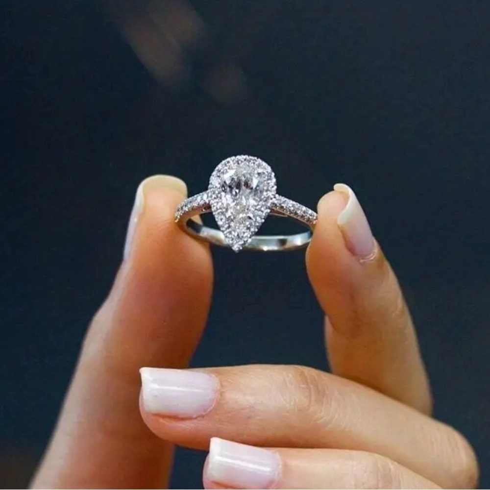Silver plated pear shaped sapphire diamond ring